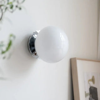 Sally frosted glass round retro wall sconce – front view