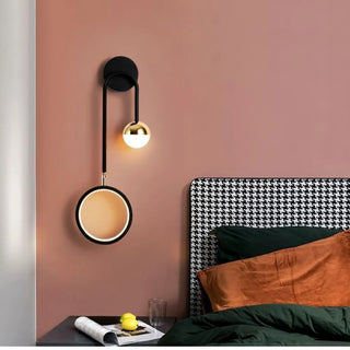 Black Scandinavian sconce installed hallway – architectural wall accent