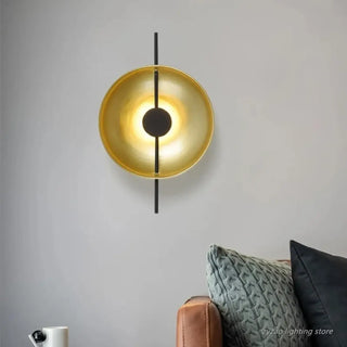 Sculptural wall sconce black brass installed modern