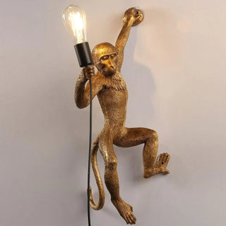 Monkey wall light playful design – side angle
