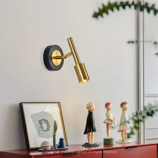 Black and gold headboard sconce installed – bedroom warm ambient glow