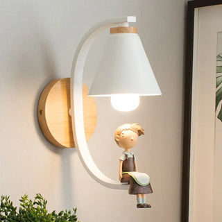 Seated girl art deco wall sconce resin black white – front