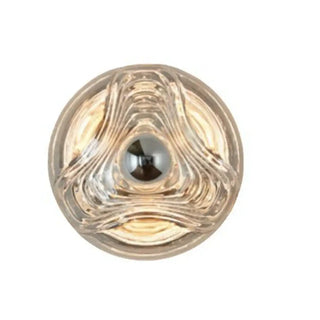 Transparent glass wall sconce close-up bubble texture