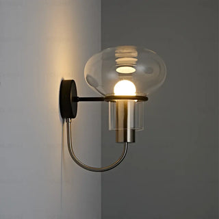 Blown glass wall sconce installed – soft halo light