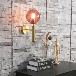 Soutore modern clear glass LED wall sconce – front view