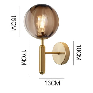 Soutore modern clear glass wall sconce bedroom setting