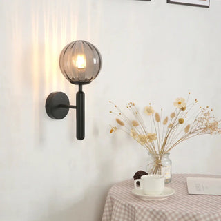 Soutore clear glass wall light – side angle