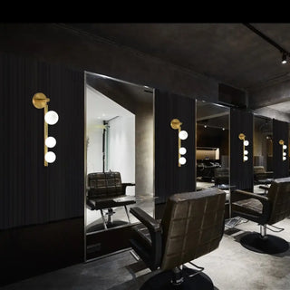 Three opaline gilded ball wall light G9 dimmable – angle view