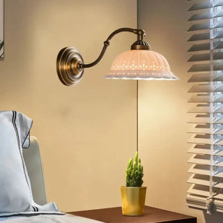 Vintage cream glass globe wall sconce bronze bracket – front view