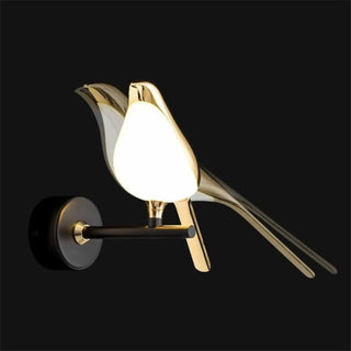 Golden bird wall sconce installed warm 3000K – detail