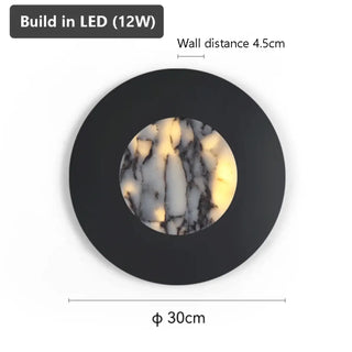 Marble wall light black metal 30cm LED – installed interior setting