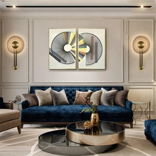 Gold circular sconce close-up G4 retro arc detail
