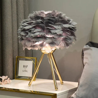 Feather table lamp side — tripod warm ambient light