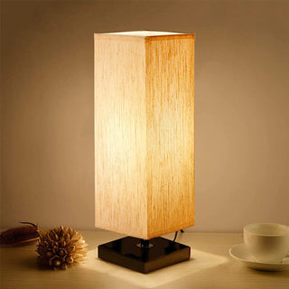 Modern ivory tower lamp front — soft glow elegant design
