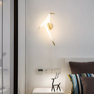 Golden bird wall sconce detail — modern gold decorative lamp