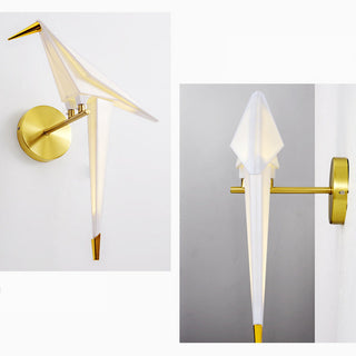 Gold bird wall sconce ambient glow — modern decorative wall light