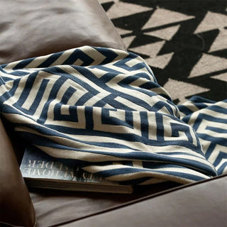 luxury knitted throw cotton geometric pattern decorative fringe blanket angle view