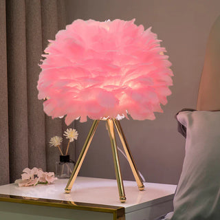 Tripod feather lamp close-up — elegant warm detail