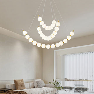 Modern brass acrylic chandelier with pearl ball design