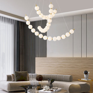 White ball chandelier with pearl LED and brass fixture