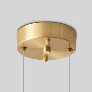 Modern white brass ball chandelier ambient — acrylic pendant warm