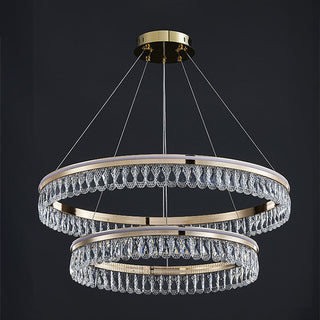 Luxury large crystal chandelier detail — ring modern dining warm texture