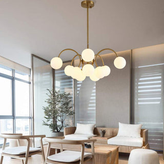 Modern gold sputnik chandelier ambient — elegant pendant warm glow