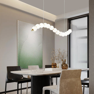 Brass acrylic chandelier with modern white ball pendants