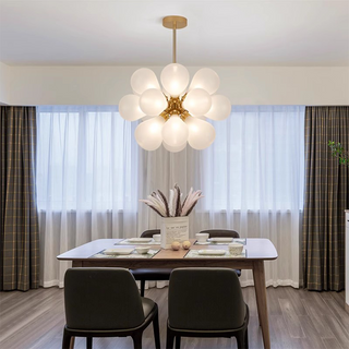 Sputnik bubble chandelier ambient — glass globe pendant warm glow