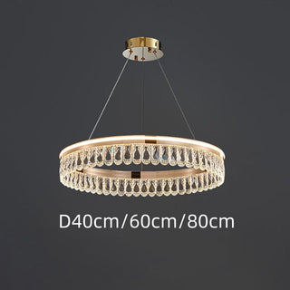 Luxury crystal ring chandelier wide view — large modern dining warm