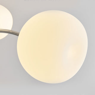 Modern white sputnik chandelier detail — globe iron pendant warm