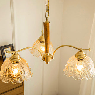 Mid-century glass petal chandelier detail — copper warm ambient texture
