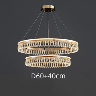 Luxury crystal ring chandelier ambient — large modern dining warm glow