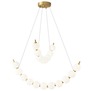 Pearl LED ball chandelier wide view — modern brass acrylic warm