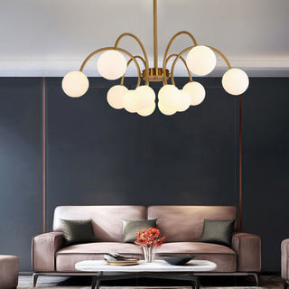 Gold sputnik chandelier illuminated — modern elegant pendant warm