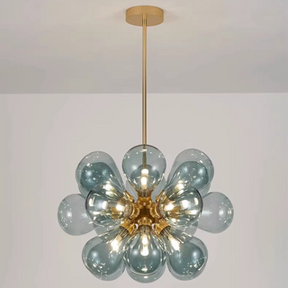 Sputnik glass bubble chandelier illuminated — globe pendant warm dining