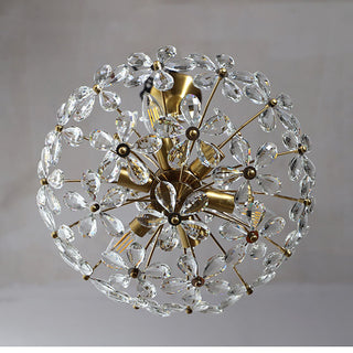 Crystal bouquet brass chandelier side — modern luxury dining warm