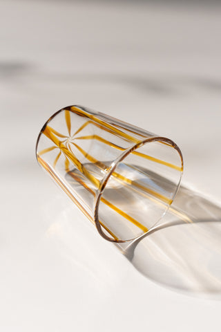 clear glass tumbler with blue stripes