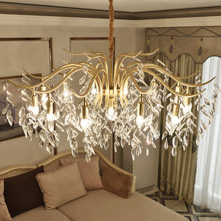 Gold tiered crystal chandelier setting — large modern dining wide