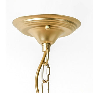 Large tiered gold chandelier side — crystal modern dining warm