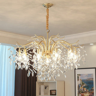 Gold crystal tiered chandelier front — large modern dining design