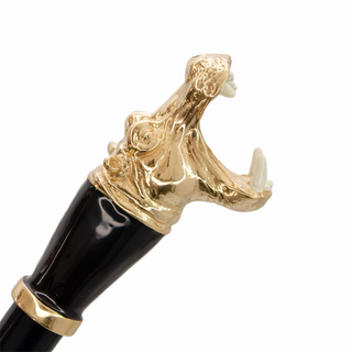 brass hippopotamus handle wooden shaft long handle handmade Italian luxury shoehorn close-up