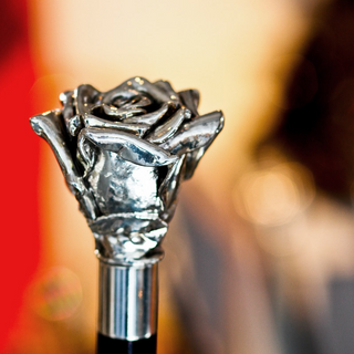 silver rose wooden shaft long handle handmade Italian luxury shoehorn angle view