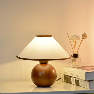 Vintage designer lamp illuminated — elegant warm glow