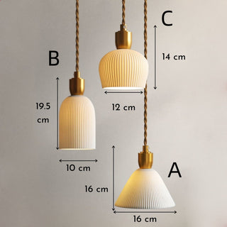 Ceramic pendant casting warm ambient glow in dining area