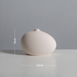 white ceramic vase modern graffiti art living room decoration macro view