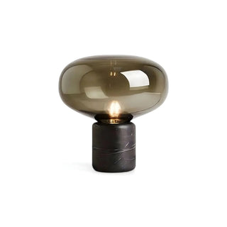 Black marble base table lamp — smoke glass orb side angle