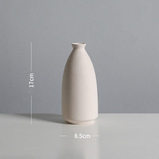 white ceramic vase modern graffiti art living room decoration overhead view