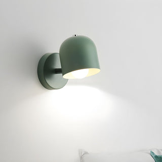 Colorful wall sconce in bright interior accent colors
