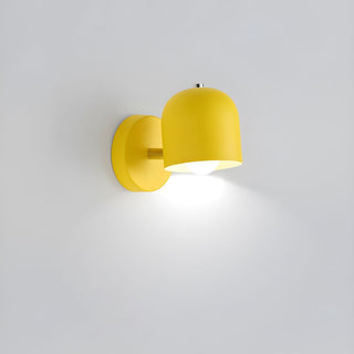 Indoor wall sconce with vibrant colored shade